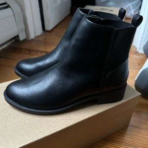 Black Chelsea boots never worn